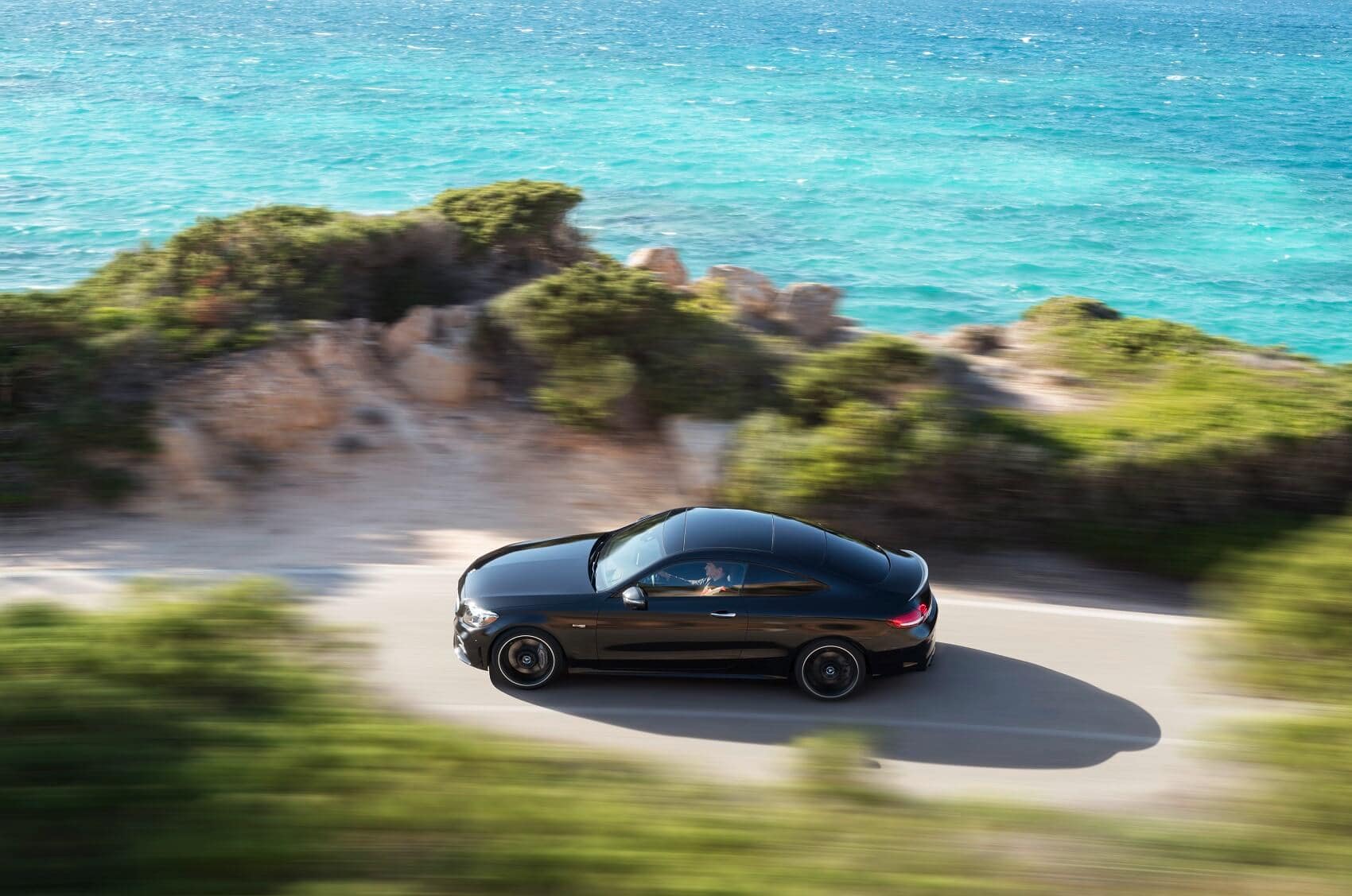 New Mercedes-Benz C-Class Driving by the Coast